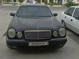Черный Mercedes-Benz E 230 1996 года, КПП Механика, в Самарканд за 7 000 y.e. id5028379, Фото №1