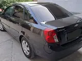 Черный Chevrolet Lacetti, 3 позиция 2013 года, КПП Автомат, в Андижан за 7 200 y.e. id6431595, Фото №1