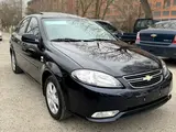 Черный Chevrolet Gentra, 3 позиция 2024 года, КПП Автомат, в Джизак за 15 350 y.e. id5040824, Фото №1