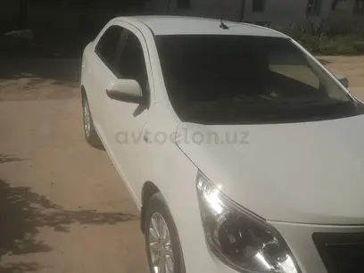 Белый Chevrolet Cobalt, 4 позиция 2014 года, КПП Автомат, в Карши за ~8 316 y.e. id5158135