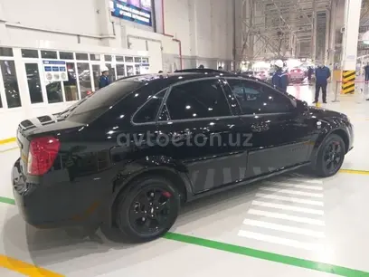 Черный Chevrolet Lacetti, 3 позиция 2022 года, КПП Автомат, в Янгиюль за ~12 312 y.e. id2892583