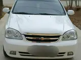 Белый Chevrolet Lacetti 2012 года, КПП Механика, в Янгиарыкский район за ~6 357 y.e. id5225363, Фото №1