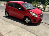 Красный Chevrolet Spark, 4 позиция 2015 года, КПП Автомат, в Бухара за 6 500 y.e. id6437609, Фото №1