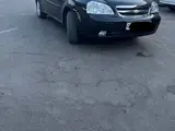 Черный Chevrolet Lacetti, 3 позиция 2011 года, КПП Автомат, в Ташкент за 8 100 y.e. id6719262, Фото №1
