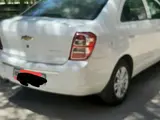 Белый Chevrolet Cobalt, 4 позиция 2023 года, КПП Автомат, в Навои за ~12 315 y.e. id5199811, Фото №1