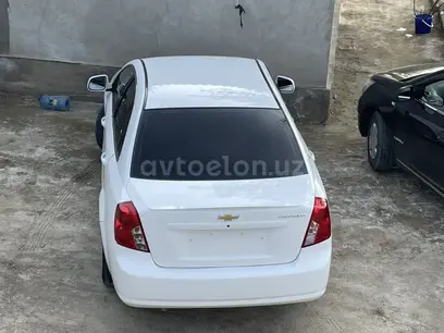 Белый Chevrolet Gentra, 2 позиция 2014 года, КПП Механика, в Бухара за 7 400 y.e. id4946513