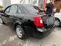 Черный Chevrolet Gentra, 3 позиция 2024 года, КПП Автомат, в Ургутский район за ~13 437 y.e. id5094964