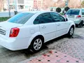 Oq Chevrolet Gentra, 1 pozitsiya 2022 yil, КПП Mexanika, shahar Termiz uchun ~11 195 у.е. id6741368