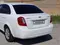 Белый Chevrolet Lacetti, 1 позиция Газ-бензин 2009 года, КПП Механика, в Самарканд за 6 900 y.e. id5161968