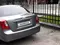 Мокрый асфальт Chevrolet Gentra, 3 позиция 2015 года, КПП Автомат, в Ташкент за 9 900 y.e. id5193651