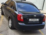 Черный Chevrolet Lacetti, 3 позиция 2010 года, КПП Автомат, в Коканд за 7 200 y.e. id5252979