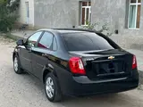 Черный Chevrolet Gentra, 3 позиция 2024 года, КПП Автомат, в Самарканд за 13 600 y.e. id5204726, Фото №1