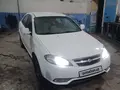 Белый Chevrolet Gentra, 1 позиция Газ-бензин 2014 года, КПП Механика, в Фергана за 6 900 y.e. id6660508