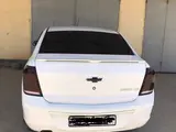 Белый Chevrolet Cobalt, 4 позиция 2022 года, КПП Автомат, в Каракульский район за 11 000 y.e. id6356075, Фото №1