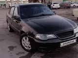 Черный Chevrolet Nexia 2, 4 позиция SOHC 2010 года, КПП Механика, в Ташкент за 5 000 y.e. id4416920, Фото №1