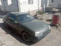 Мокрый асфальт Opel Omega 1986 года, КПП Механика, в Андижан за ~1 232 y.e. id7069119