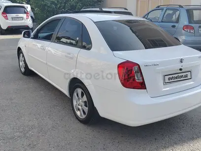 Белый Chevrolet Lacetti, 3 позиция 2019 года, КПП Автомат, в Андижан за 13 300 y.e. id2425736