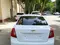 Белый Chevrolet Lacetti, 2 позиция 2024 года, КПП Механика, в Самарканд за 12 700 y.e. id5174485