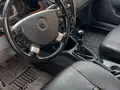 Мокрый асфальт Chevrolet Gentra, 3 позиция 2013 года, КПП Механика, в Андижан за 6 300 y.e. id6614777