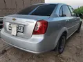 Серебристый Chevrolet Gentra, 1 позиция Газ-бензин 2014 года, КПП Механика, в Янгиарык за ~7 599 y.e. id6461370
