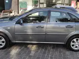 Мокрый асфальт Chevrolet Lacetti, 3 позиция 2012 года, КПП Автомат, в Ташкент за 7 600 y.e. id5212018, Фото №1