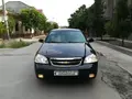 Черный Chevrolet Lacetti, 1 позиция 2012 года, КПП Механика, в Ташкент за 6 500 y.e. id6381479