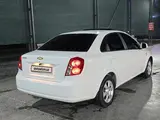 Белый Chevrolet Gentra, 3 позиция 2022 года, КПП Автомат, в Фергана за 13 800 y.e. id5222279, Фото №1