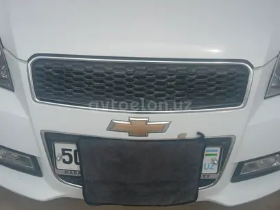Белый Chevrolet Nexia 3, 2 позиция 2019 года, в Наманган за 9 600 y.e. id4869543
