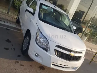 Белый Chevrolet Cobalt, 3 позиция 2024 года, КПП Механика, в Шахрисабзский район за ~9 875 y.e. id5224224