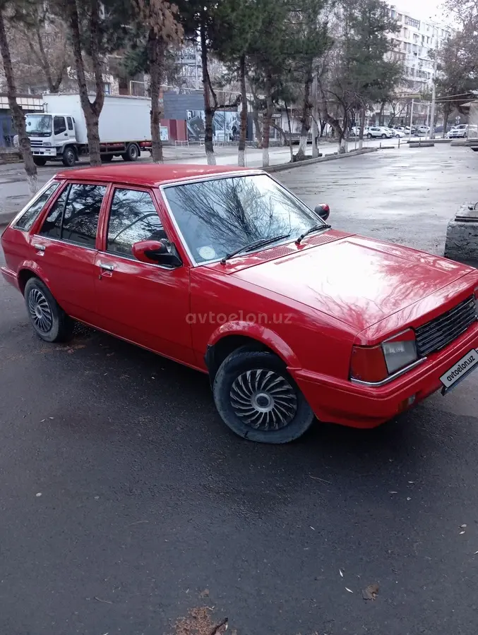 Mazda 323 — 3