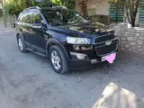 Черный Chevrolet Captiva, 3 позиция 2013 года, КПП Автомат, в Бухара за 13 300 y.e. id6714321, Фото №1