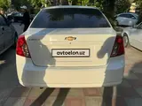 Белый Chevrolet Gentra, 3 позиция 2022 года, КПП Автомат, в Самарканд за 13 650 y.e. id5030649, Фото №1