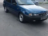 Синий Daewoo Nexia 1999 года, КПП Механика, в Джизак за ~3 397 y.e. id6400399, Фото №1