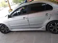 Серебристый Mitsubishi Lancer 2008 года, КПП Автомат, в Фергана за 8 000 y.e. id6394628