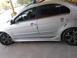 Серебристый Mitsubishi Lancer 2008 года, КПП Автомат, в Фергана за 8 000 y.e. id6394628, Фото №1