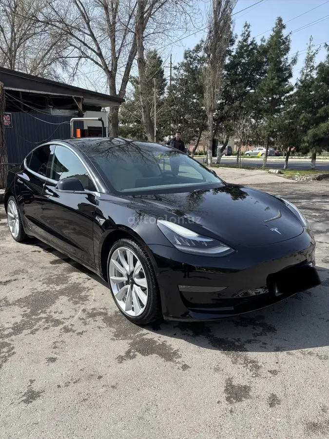 Tesla Model 3 — 3