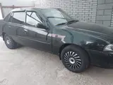 Qora Chevrolet Nexia 2, 2 pozitsiya DOHC 2009 yil, КПП Mexanika, shahar Pitnak uchun ~3 465 у.е. id6441151, Fotosurat №1