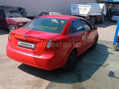Красный Chevrolet Gentra, 1 позиция Газ-бензин 2014 года, КПП Механика, в Ташкент за 8 300 y.e. id5125544