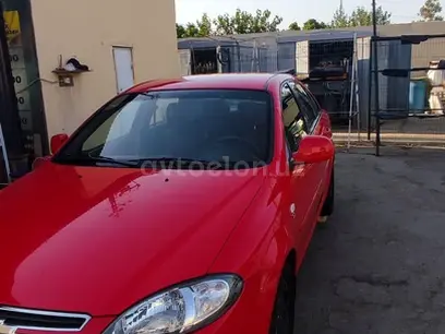 Красный Chevrolet Gentra, 1 позиция 2015 года, КПП Механика, в Бухара за 8 200 y.e. id5207941