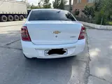 Белый Chevrolet Cobalt, 4 позиция 2019 года, КПП Автомат, в Наманган за 10 700 y.e. id5024688, Фото №1