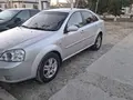 Серебристый Chevrolet Lacetti, 3 позиция 2013 года, КПП Автомат, в Самарканд за 6 900 y.e. id7041594