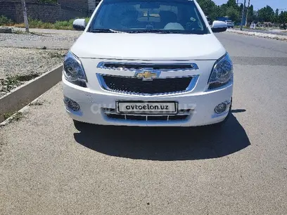 Белый Chevrolet Cobalt, 4 позиция 2022 года, КПП Автомат, в Джизак за 11 450 y.e. id5183455