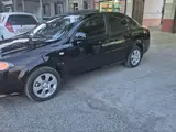 Черный Chevrolet Gentra, 3 позиция 2021 года, КПП Автомат, в Андижан за 14 000 y.e. id5025622, Фото №1
