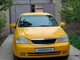 Жёлтый Chevrolet Lacetti, 2 позиция 2011 года, КПП Механика, в Самарканд за 6 200 y.e. id5230660, Фото №1