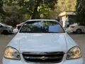 Белый Chevrolet Lacetti, 3 позиция 2010 года, КПП Автомат, в Ташкент за 8 950 y.e. id6653858
