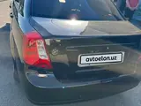 Черный Chevrolet Gentra, 3 позиция 2015 года, КПП Автомат, в Ташкент за 7 800 y.e. id5226335, Фото №1