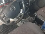 Черный Chevrolet Lacetti, 2 позиция 2011 года, КПП Механика, в Бухара за 7 000 y.e. id6712348, Фото №1
