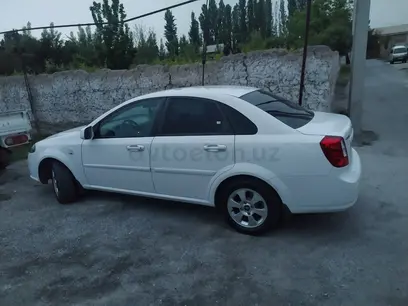 Белый Chevrolet Gentra, 1 позиция 2015 года, КПП Механика, в Фергана за 8 500 y.e. id5192185