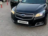 Черный Chevrolet Malibu, 3 позиция 2013 года, КПП Автомат, в Ташкент за 11 150 y.e. id6529176, Фото №1