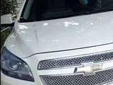 Молочный цвет Chevrolet Malibu, 2 позиция 2012 года, КПП Механика, в Денау за ~11 139 y.e. id6355836, Фото №1